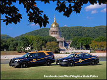 WVSP cruisers in front of the WV State Capital building.